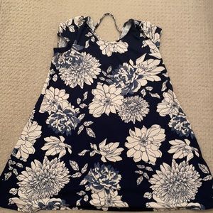 Blue flowery dress with back cut out.